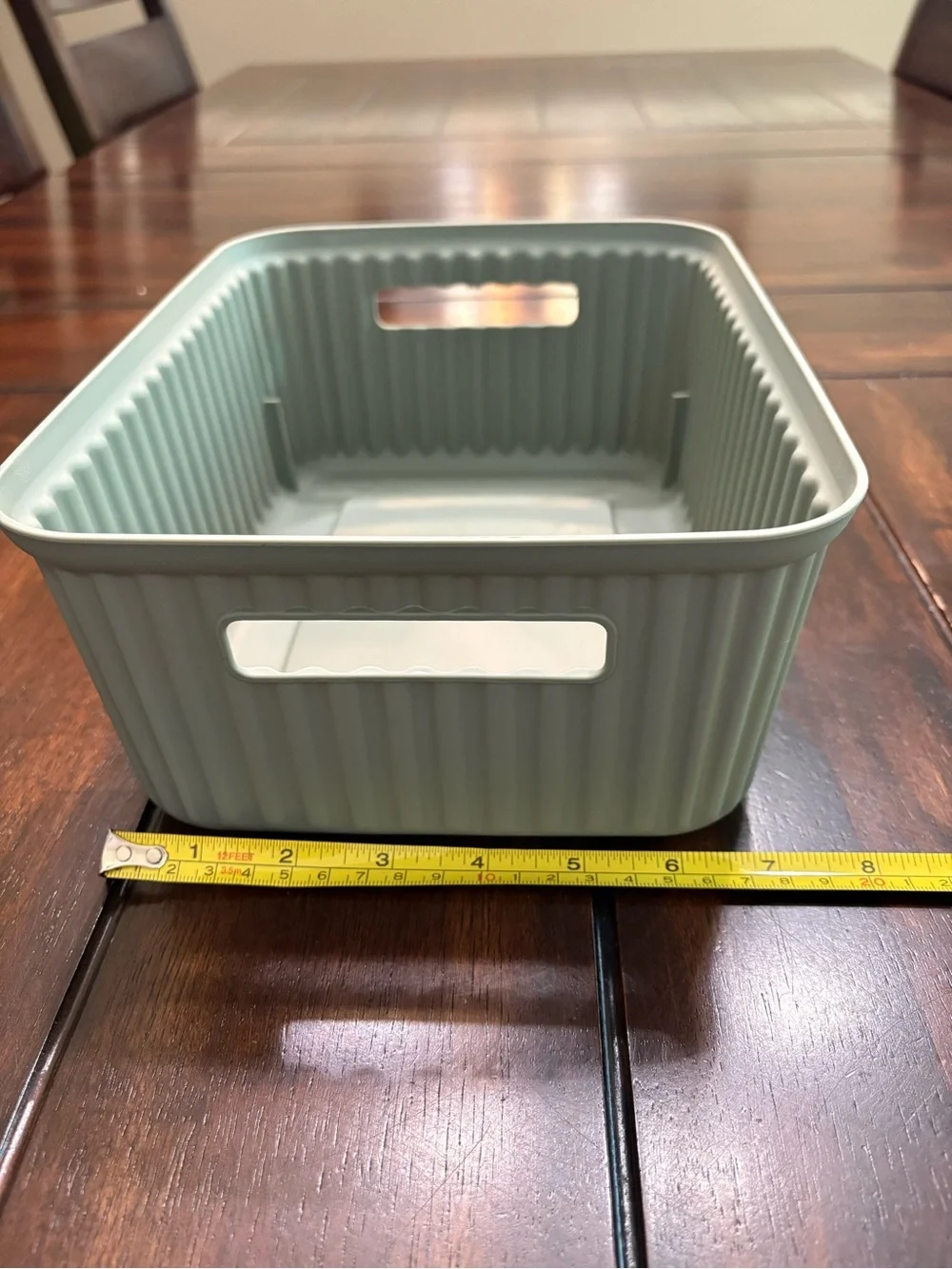 Set of 7 sage green plastic storage containers